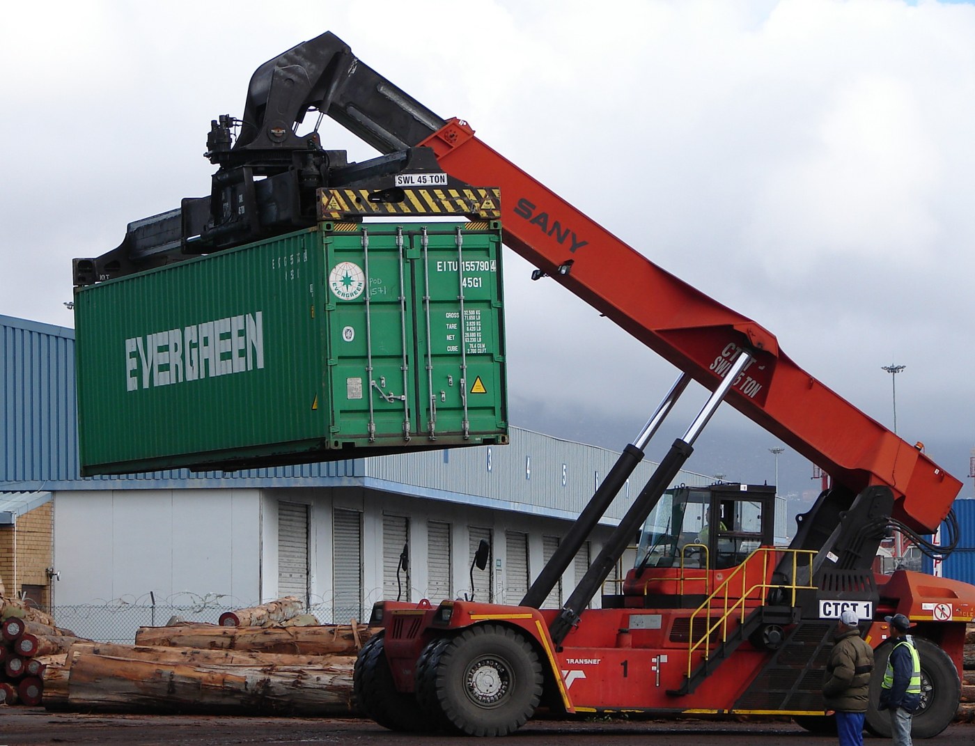Photograph of green 40-foot high cube shipping containers